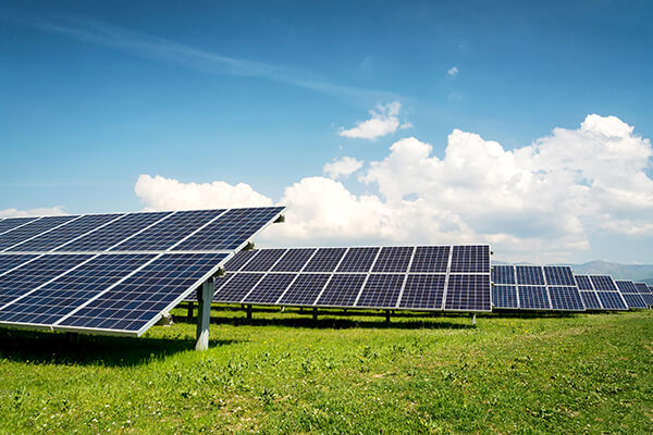 An example of solar panels in an open field.