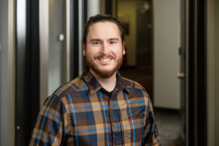 Employee headshot of Joshua Burton