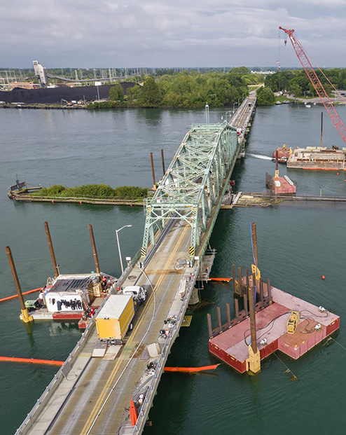 An overhead view of the Grosse Ile Parkway Bridge near Detroit, Michigan, during underwater pier repairs.