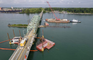 An overhead view of the Grosse Ile Parkway Bridge near Detroit, Michigan, during underwater pier repairs.