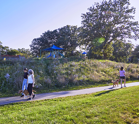 Residents walking on a community trail.