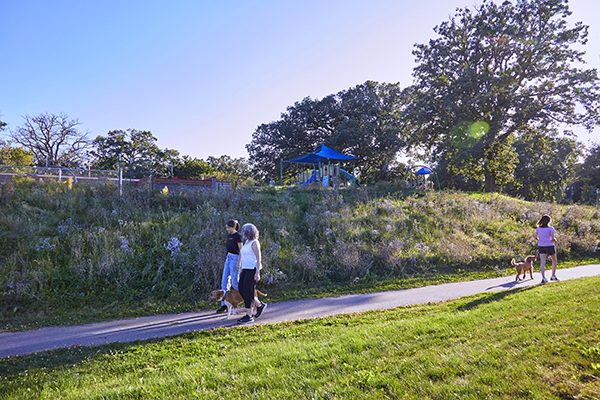 Residents walking on a community trail.