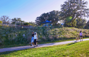 Residents walking on a community trail.