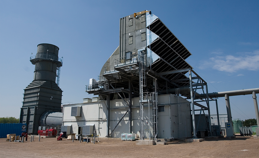 Industrial power facility with steel structures and equipment.