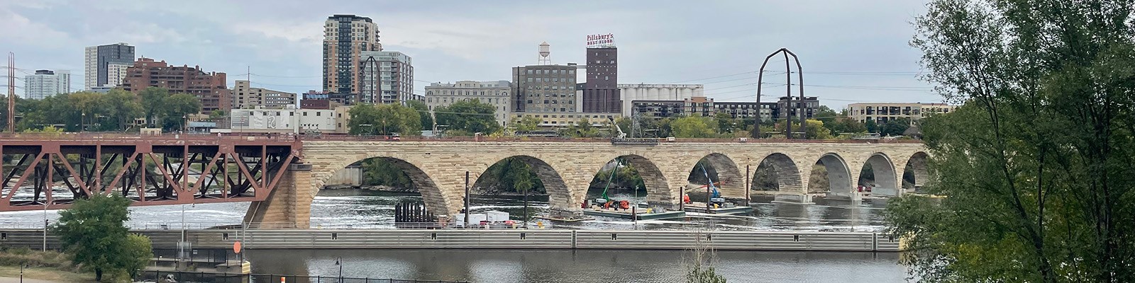 Flow diverter around the Stone Arch bridge to allow underwater repairs.