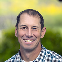 Headshot of Adam Howard