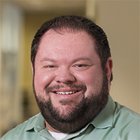 Headshot of Adam Blakesley